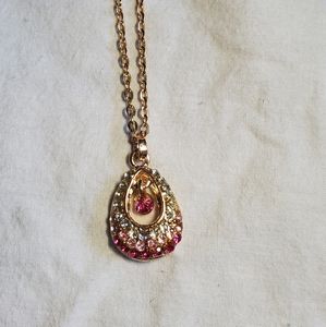 Gold necklace with pink and white gems